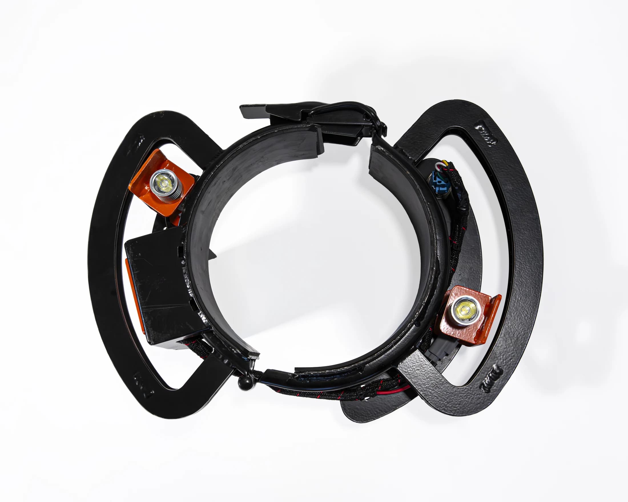 Torch vacuum-tube clamp on white, with its lights off.