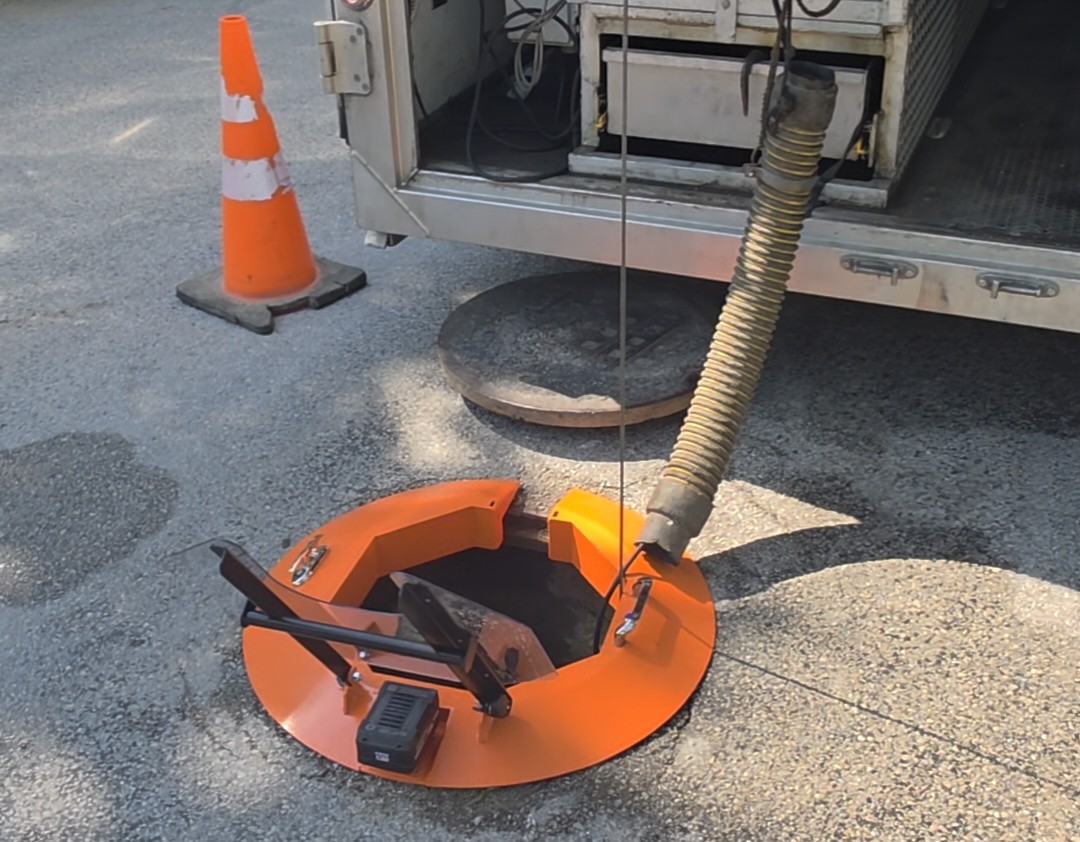 The Light Ring deployed at CCTV inspection jobsite as an engineering control supporting OSHA manhole safety compliance.